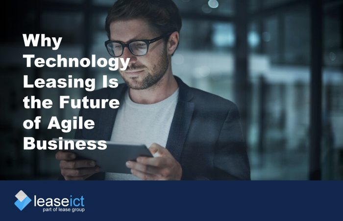 Title image of a man holding a tablet device to illustrate the benefit of technology leasing