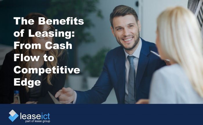 three people talking to illustrate discussing the benefits of leasing