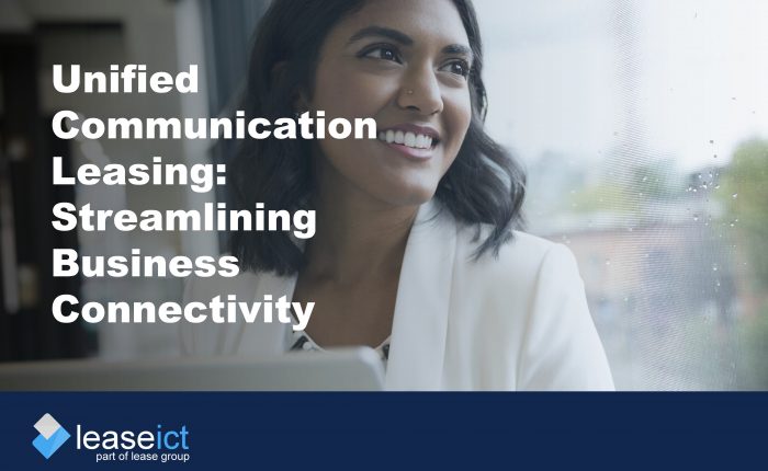 image of smiling woman using work tablet to illustrate the benefits of unified communication leasing