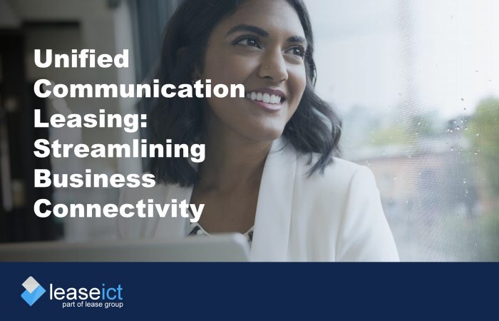 image of smiling woman using work tablet to illustrate the benefits of unified communication leasing