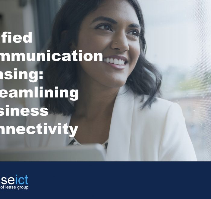 image of smiling woman using work tablet to illustrate the benefits of unified communication leasing